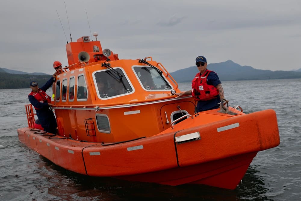 Coast guard boat, 2 people